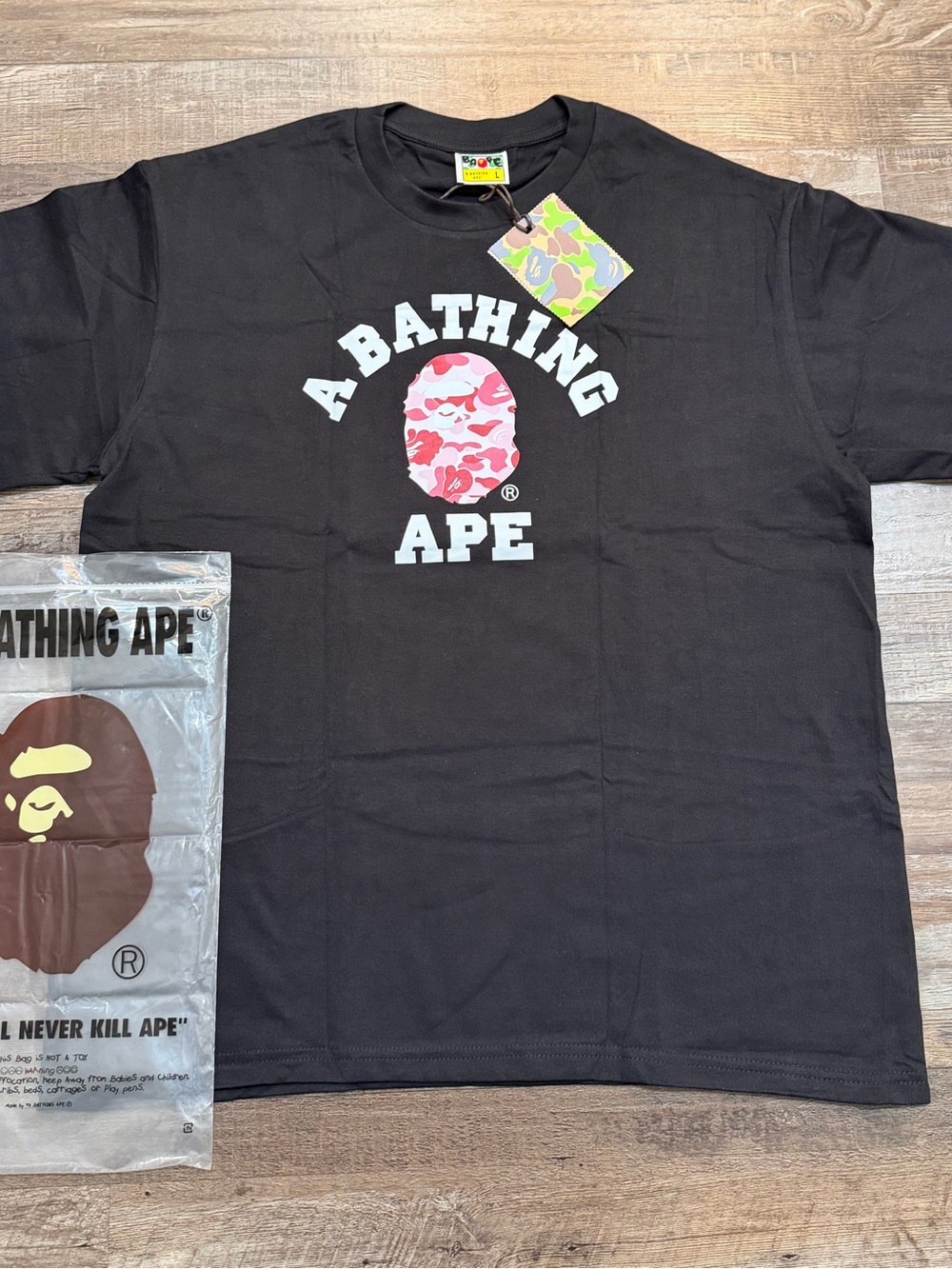 A Bathing Ape Black Short-Sleeve Logo Tee with Pink Camo Ape